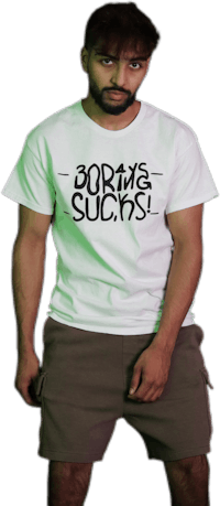 a man wearing a white t - shirt that says born sucks